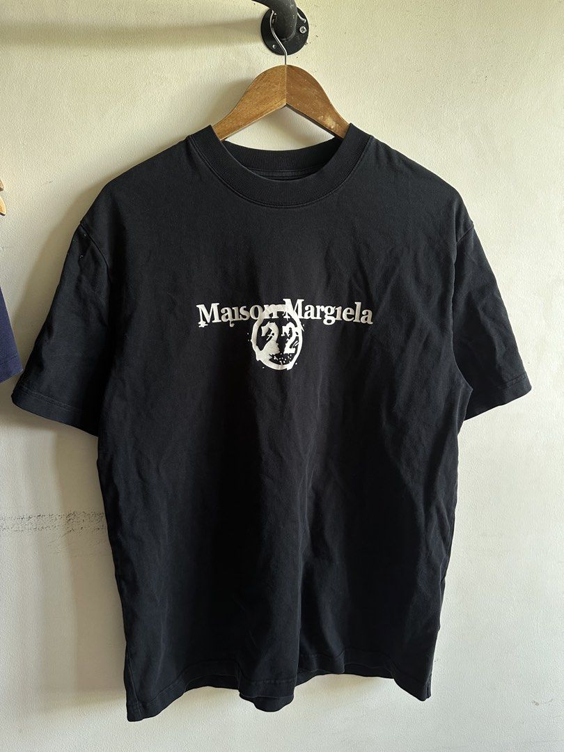 Maison Margiela 22 Calendar Tshirt (Category: Tshirts & Polo Shirts ) located in Daet. Submitted by rccurated._ (Listing ID 1467899865, Image 1). Description: No neck tag Excellent neckline 9.8 or better condition and color rate .