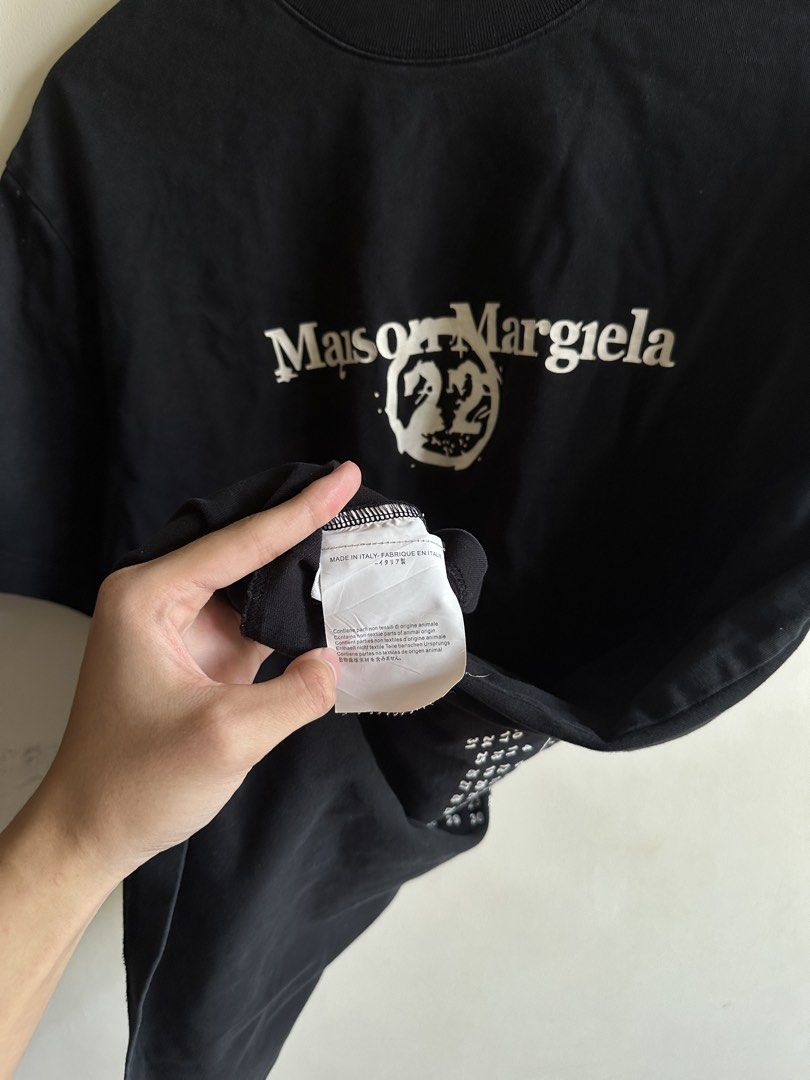Maison Margiela 22 Calendar Tshirt (Category: Tshirts & Polo Shirts ) located in Daet. Submitted by rccurated._ (Listing ID 1467899865, Image 3). Description: No neck tag Excellent neckline 9.8 or better condition and color rate .