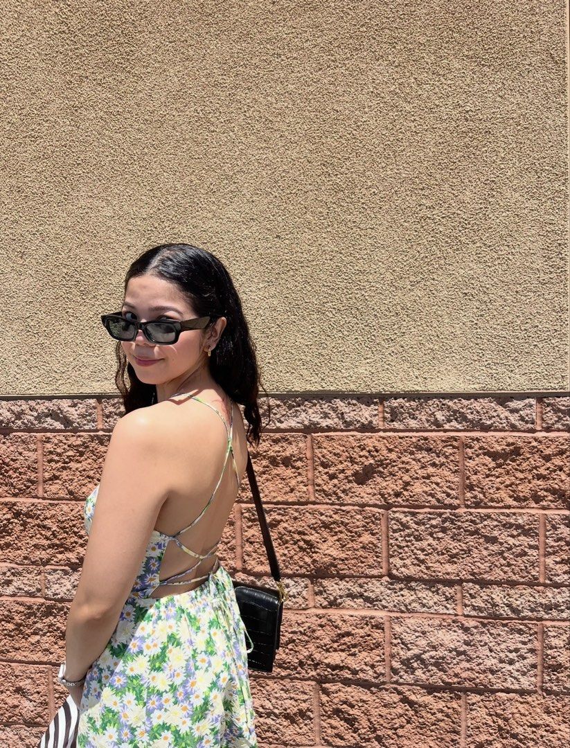 Mango Floral Backless Midi Dress (Category: Dresses) located in Quezon City. Submitted by prelovedbynxkole (Listing ID 1467880360, Image 3). Description: - Daisy print midi dress with green stems - Size: EUR M / USA 6 / MEX M - Features thin spaghetti straps, open back, elastic waist, and side slit - Perfect for casual outings, dates, or vacations ALL CLOTHES NEED TO BE WASHED & IRONED AS THEY HAVE BEEN SITTING IN STORAGE <3 Shipping from QC! J&T