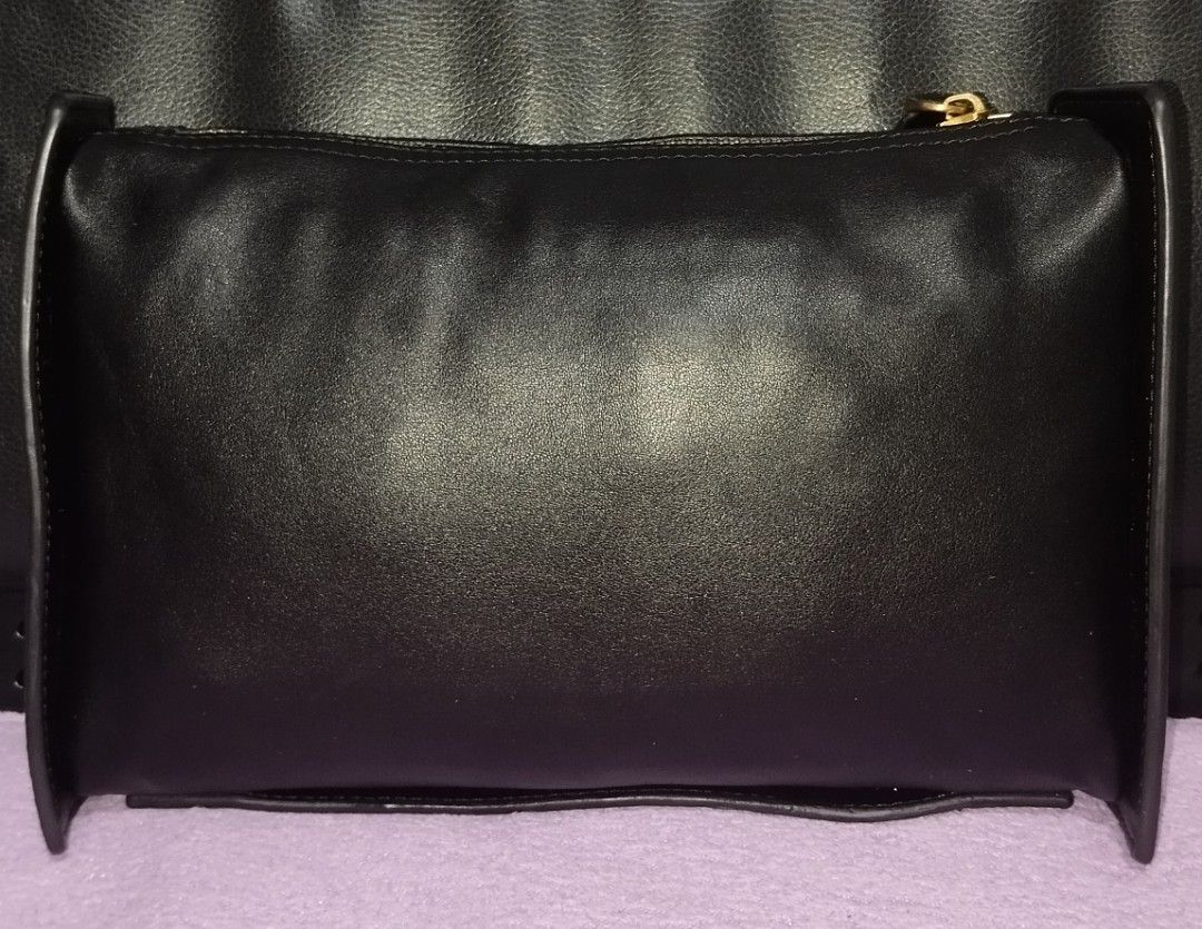 Many Atelier Carmen Zip Two Way Sling Bag (Category: Luxury Bags & Wallets) located in Taguig. Submitted by bellecabano (Listing ID 1467842483, Image 3). Description: Manu Atelier Carmen Zip Two Way Sling Bag can be worn also as clutch ( has detachable strap ) a quiet luxury made in Turkey, searchable and with hologram inner lining own strap - gold pa no rips and tears, no pen/ink marks no uka uka or cracking lighy used lang talaga si bag ready t