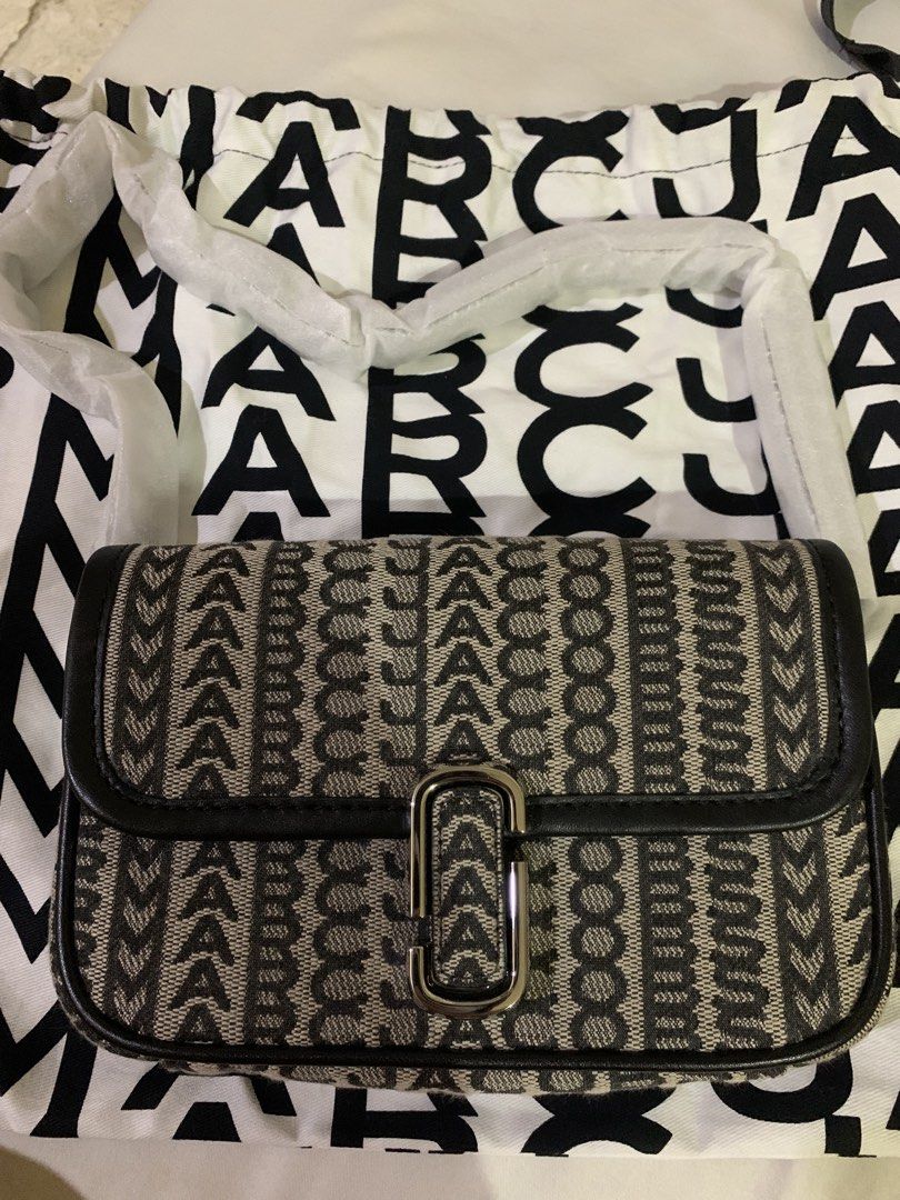 Marc Jacobs (Category: Luxury Bags & Wallets) located in Quezon City. Submitted by marjoretz (Listing ID 1467874670, Image 1). Description: Marc Jacobs Monogram Jacquard L Marc Shoulder bag BRAND NEW.