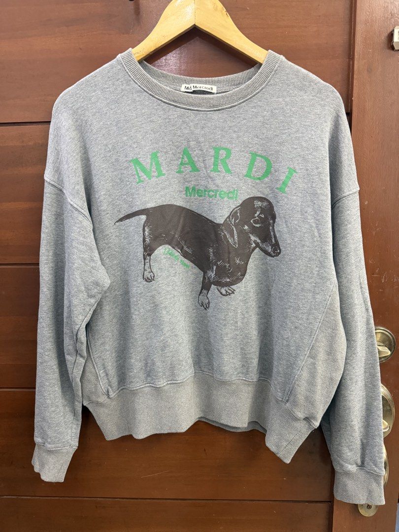 Mardi Mercredi Grey Dachshund Sweatshirt (Category: Longsleeves) located in Lipa City. Submitted by cokelight11 (Listing ID 1468054416, Image 1). Description: Mardi Mercredi Style: Crewneck sweatshirt in grey with iconic black dachshund Material: 100% premium heavyweight cotton Fit: Boxy (24x25) Condition: Excellent quality Perfect for casual and everyday outfits.