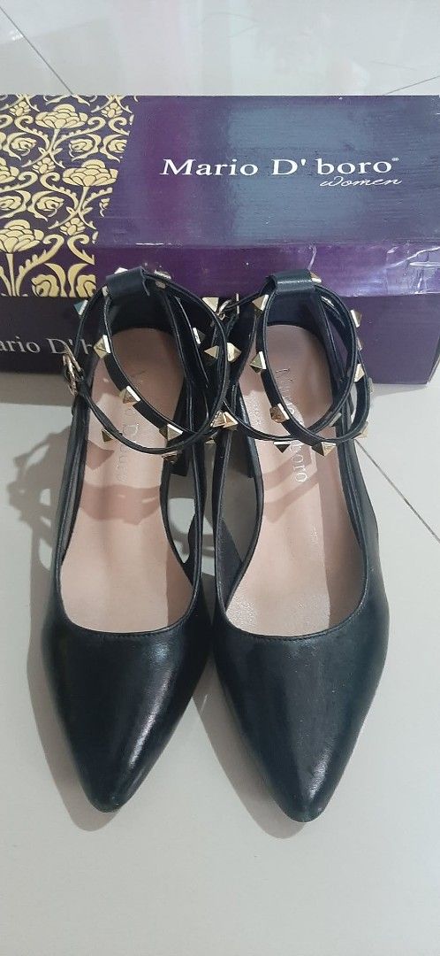 Mario D'boro Black Studded Ankle Strap Heels (Category: Heels) located in Baguio. Submitted by fiercepenguin.7cad8d (Listing ID 1467966704, Image 1). Description: - Brand: Mario D'boro - Style: Black pointed-toe heels with chunky block heels - Details: Double ankle straps with gold-tone pyramid studs and buckle closures - Size: Check size details inside the shoe - Condition: Worn once, clean soles, great leather condition - Inclusions: Original p