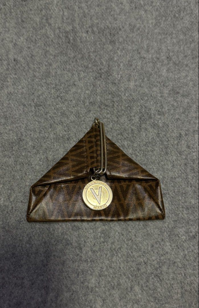 Mario Valentino Triangular Coin Purse (Category: Purses & Pouches) located in Rizal. Submitted by eecezy2thrift (Listing ID 1467904638, Image 1). Description: Cute Nito * Maganda pa po ito nilagay ko lang sa well Used * andiyan na po Lahat Details * as is 📌 𝗜𝗠𝗣𝗢𝗥𝗧𝗔𝗡𝗧 𝗡𝗢𝗧𝗘 ☟︎. 🚨◎ 𝗗𝗜𝗦𝗖𝗟𝗔𝗜𝗠𝗘𝗥: 𝗜 𝗵𝗲𝗿𝗲𝗯𝘆 𝗱𝗲𝗰𝗹𝗮𝗿𝗲 𝘁𝗵𝗮𝘁 𝗶 𝗱𝗼 𝗻𝗼𝘁 𝗼𝘄𝗻 𝘁𝗵𝗲 𝗿𝗶𝗴𝗵𝘁𝘀 𝗼𝗳 𝗮𝗻𝘆 𝗼𝗳 𝘁𝗵𝗲 𝗯𝗿𝗮𝗻𝗱𝘀 𝗹𝗶𝘀𝘁𝗲𝗱. 
