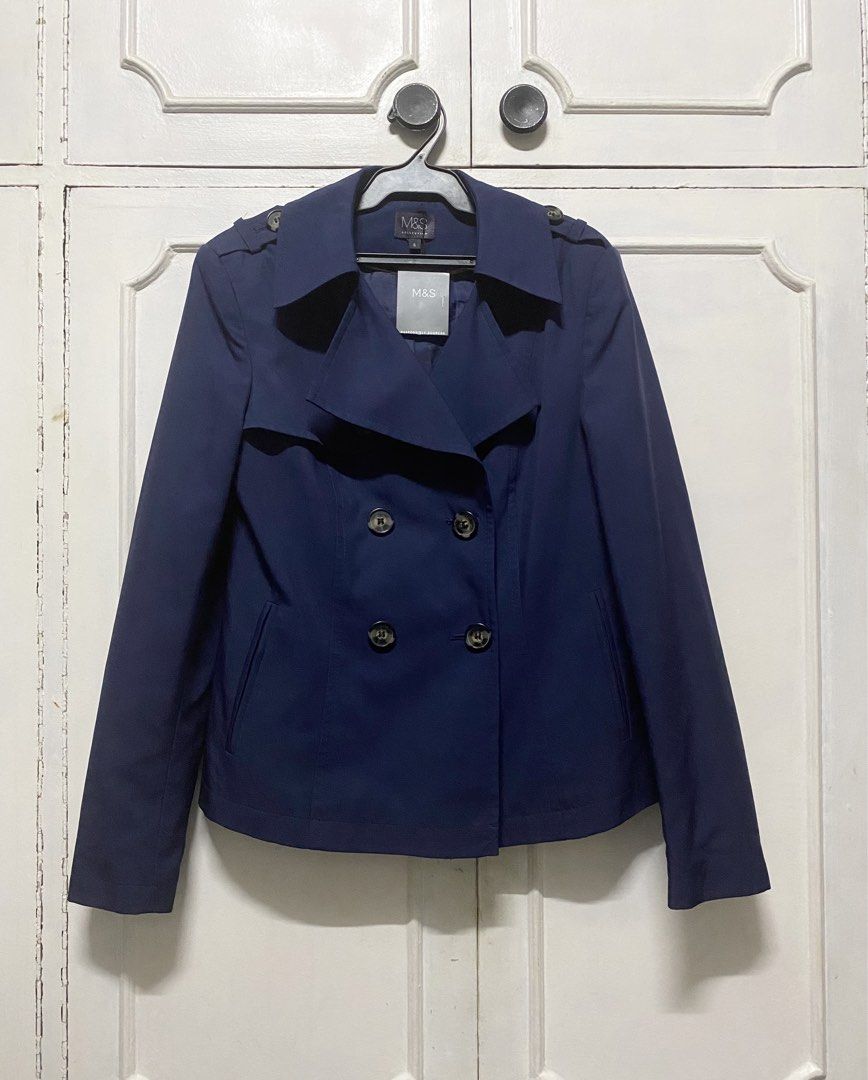 Marks & Spencer Ivy League Style Preppy Style Dark Academia Navy Blue Double Breasted Double Buttoned Short Trench Coat Blazer Jacket (Category: Coats, Jackets and Outerwear) located in Quezon City. Submitted by madame_royale (Listing ID 1467987012, Image 1). Description: Measurements: in inches Shoulder > 15” Chest > 18.5” Sleeves > 24” Length > 24” - Brand: Marks & Spencer - Color: Classic navy blue - Size: UK 6 / EUR 34 / CN 155/80A - Conditio