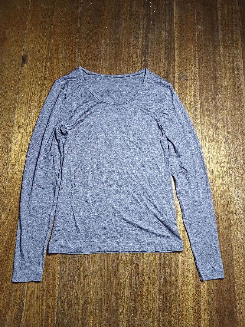 Marks & Spencer winter inner warm women's medium (Category: Longsleeves) located in Mandaluyong City. Submitted by heatgear (Listing ID 1467939879, Image 1). Description: - Brand: Marks & Spencer - Size: UK 14 - Color: Grey marl - Style: Long sleeve top with scoop neckline - Material: 66% acrylic, 29% viscose, 5% elastane (lightweight stretch) - Condition: Clean, excellent, and ready to wear - Features: Great basic layering piece for cooler weath