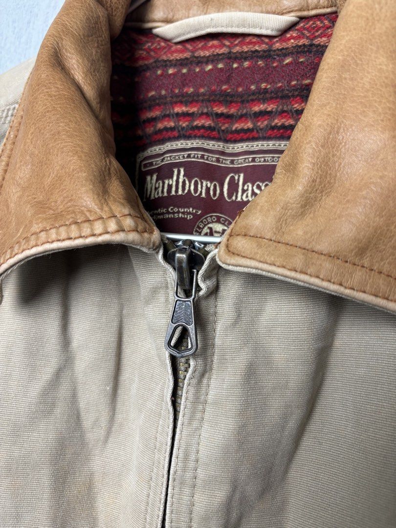 Marlboro Classics Leather Collar Aztec Lining Harrington Jacket (Category: Coats, Jackets and Outerwear) located in Mandaluyong City. Submitted by fellas_ph (Listing ID 1467940545, Image 3). Description: Excellent condition No issues Size S-M 21" Width 25" Length 17" Shoulders 26" Sleeve Length.