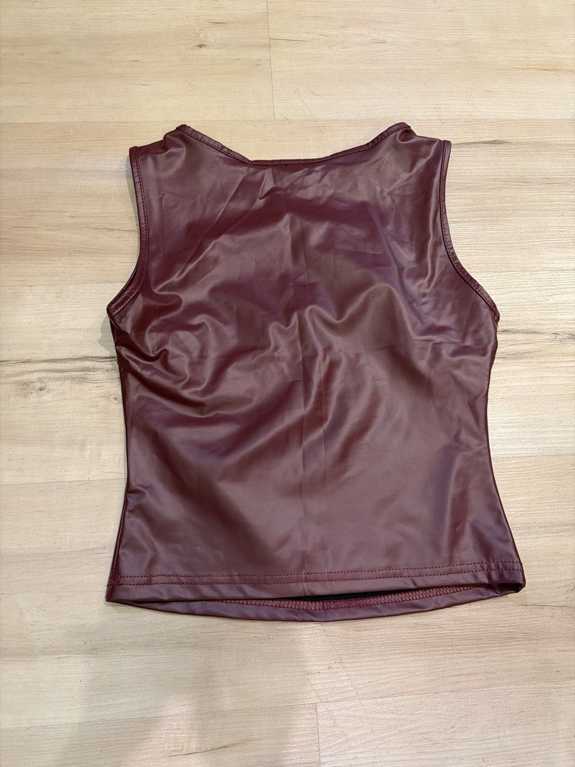 Maroon Faux Leather Tank Top (Category: Sleeveless) located in Manila. Submitted by _____car0usell (Listing ID 1467958586, Image 2). Description: fits xxs-xs used once only.