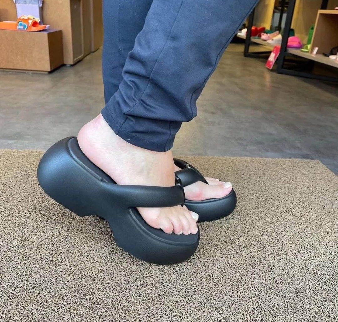 Melissa Platform Flip Flops Black (Category: Flats & Sandals) located in Bulacan. Submitted by adethangeles (Listing ID 1468058278, Image 3). Description: - Brand: Melissa - Style: Platform thong sandals / chunky wedge heel - Color: Solid black - Details: Thick straps, branded badge on toe post, heavy cushioning - Condition: Worn just a couple of times, extremely clean soles and uppers with no major scuffs - Features: Great height boost, super co