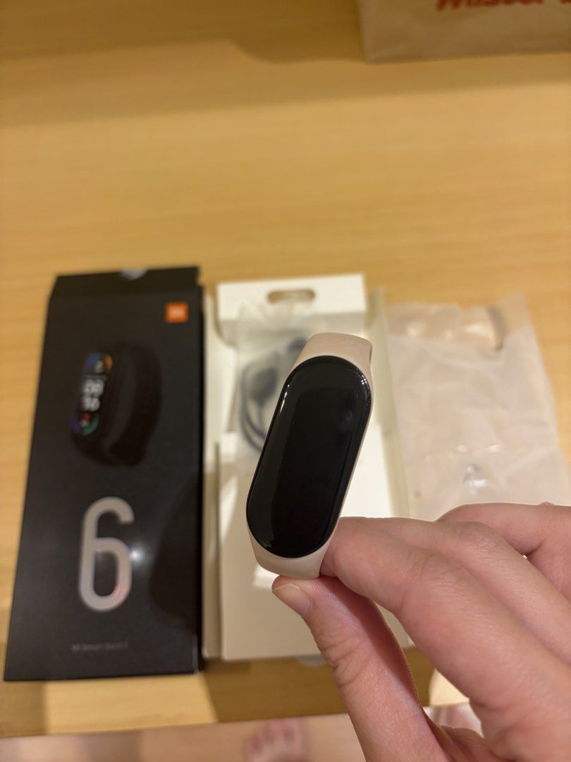 Mi Band 6 (Category: Wearables & Smart Watches) located in Marikina City. Submitted by jlram (Listing ID 1468016178, Image 2). Description: with box, plastic and charger, and pink band .