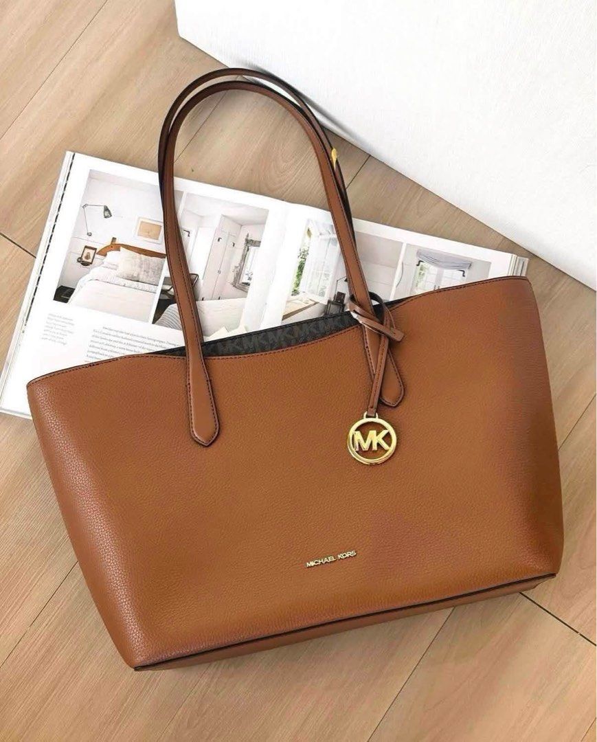 Michael Kors Arden Totebag (Category: Tote Bags) located in Tarlac. Submitted by twin8dresserr (Listing ID 1468051851, Image 1). Description: Onhand Pinas ✅ 𝐌𝐢𝐜𝐡𝐚𝐞𝐥 𝐊𝐨𝐫𝐬 𝐀𝐫𝐝𝐞𝐧 𝐋𝐚𝐫𝐠𝐞 𝐓𝐨𝐭𝐞 𝐁𝐚𝐠 Can fit laptop and folders inside - 100% leather - Gold-tone hardware - 18”W X 10.5”H X 5”D - Handle drop: 11” - Exterior details: front slip pocket - Interior details: back zip pocket P8,295.