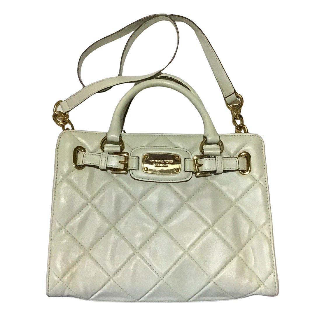 Michael Kors Hamilton Quilted Leather Tote - Off-white (Category: Luxury Bags & Wallets) located in Sorsogon. Submitted by sprucemuse (Listing ID 1467937280, Image 1). Description: Brand: Michael Kors Color: Off-white Type: Hand and Crossbody Bag Size: 33cm x 14cm x 24cm (Med-Large) Material: Genuine leather (outer), Textile (inner) Hardware: Gold Features: 1 zippered inner middle pocket, 1 zippered inner pocket, 4 open inner pockets, non-removab