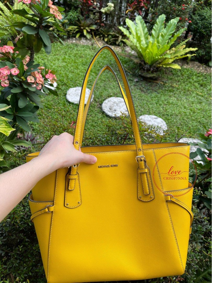 Michael Kors Yellow Tote Bag (Category: Tote Bags) located in Batangas. Submitted by lovecrishonna (Listing ID 1468033126, Image 1). Description: Decluttering Almost new di nagamit nakastore lang With care card Decluttering.