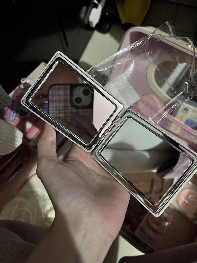Michaela Monogram Compact Mirror (Category: Mirrors) located in Manila. Submitted by leiluvsu (Listing ID 1467948097, Image 2). Description: BNEW MICHALEA MIRROR WITH ORIGINAL PACKAGING - Stylish monogram print pattern - Dual mirrors inside for easy touch-ups - Compact size fits easily in any handbag or makeup pouch 👛 mop : gcash | maya | bpi 📦 mod : jnt | lbc 📍 loc : mendiola / cavite .