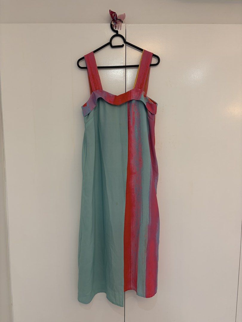 Minor Miracles Color Block Midi Dress (Category: Dresses) located in Quezon City. Submitted by prelovedbynxkole (Listing ID 1467880370, Image 1). Description: - Brand: Minor Miracles - Style: Sleeveless midi dress with bold striped graphic pattern in turquoise, pink, and orange - Fit/Size: UK 8, US 4, EU 36 - Design details: Square neckline, wide straps, back zip closure, mid-calf length - Material: 100% polyester (Designed in Singapore, Made in 