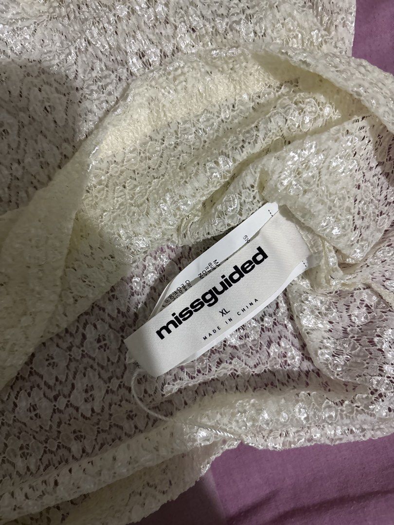 misguided mesh halter top (Category: Sleeveless) located in Manila. Submitted by iyahpreloved_ (Listing ID 1468017315, Image 3). Description: never been used size XL.
