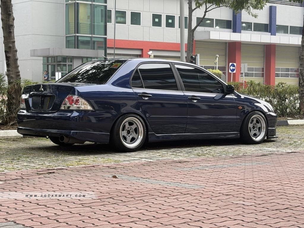 Mitsubishi Lancer 1.6 GLX (M) (Category: Used Cars) located in Singapore. Submitted by jonleong (Listing ID 1467901432, Image 3). Description: Mitsubishi lancer CS3 MANUAL unit for sale! Car has been taken care of both internally and externally! All done up! Just left to ride it out until end of COE and renew the COE! Mod list below : Drift racing gen 2 full system exhaust (w cert) Rotiform 15" deepdish rims in hypersilver Aftermarket OMP steerin