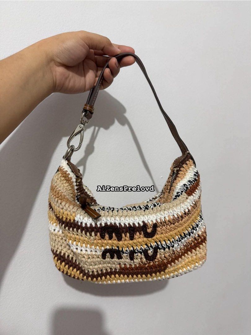 MIUMIU Crochette Shoulder bag (Category: Luxury Bags & Wallets) located in Trece Martires City. Submitted by preluvcav (Listing ID 1467844684, Image 1). Description: no flws like new u can pm blueApp (AiZensPrelovd).