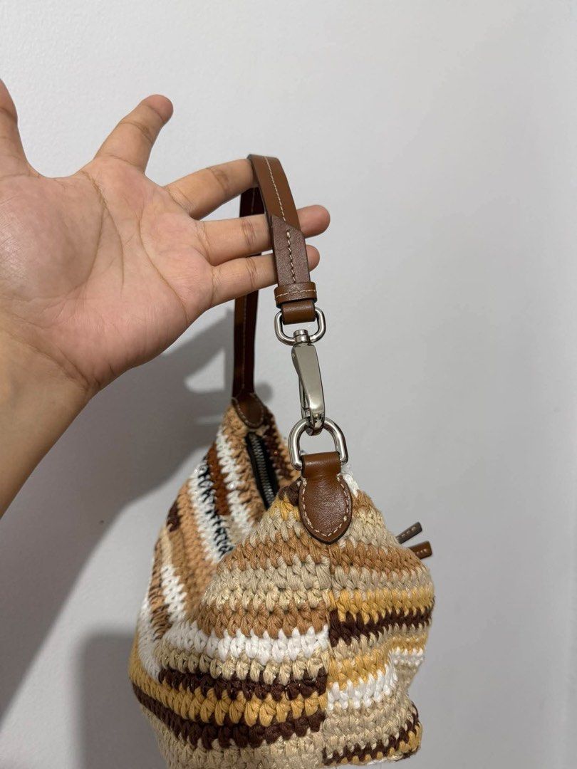 MIUMIU Crochette Shoulder bag (Category: Luxury Bags & Wallets) located in Trece Martires City. Submitted by preluvcav (Listing ID 1467844684, Image 2). Description: no flws like new u can pm blueApp (AiZensPrelovd).
