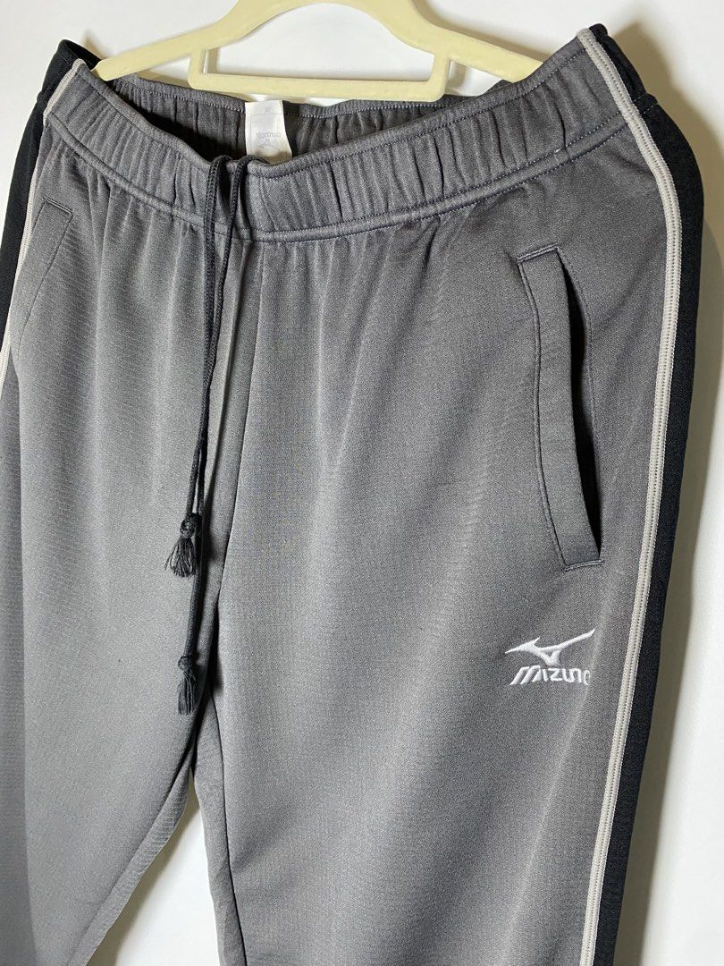 Mizuno gray track pants size xl (Category: Activewear) located in Makati City. Submitted by indaysukaycloset (Listing ID 1467891833, Image 2). Description: Mizuno Gray Track Pants - Size XL (authentic ) Details: - Brand: Mizuno (embroidered logo, not print) - Size on tag: XL good for large to xl - Color: Gray with Black side panel + white piping - Condition: Preloved / in good condition , no flaws - Unisex - pwede pang babae / lalaki Features: - 