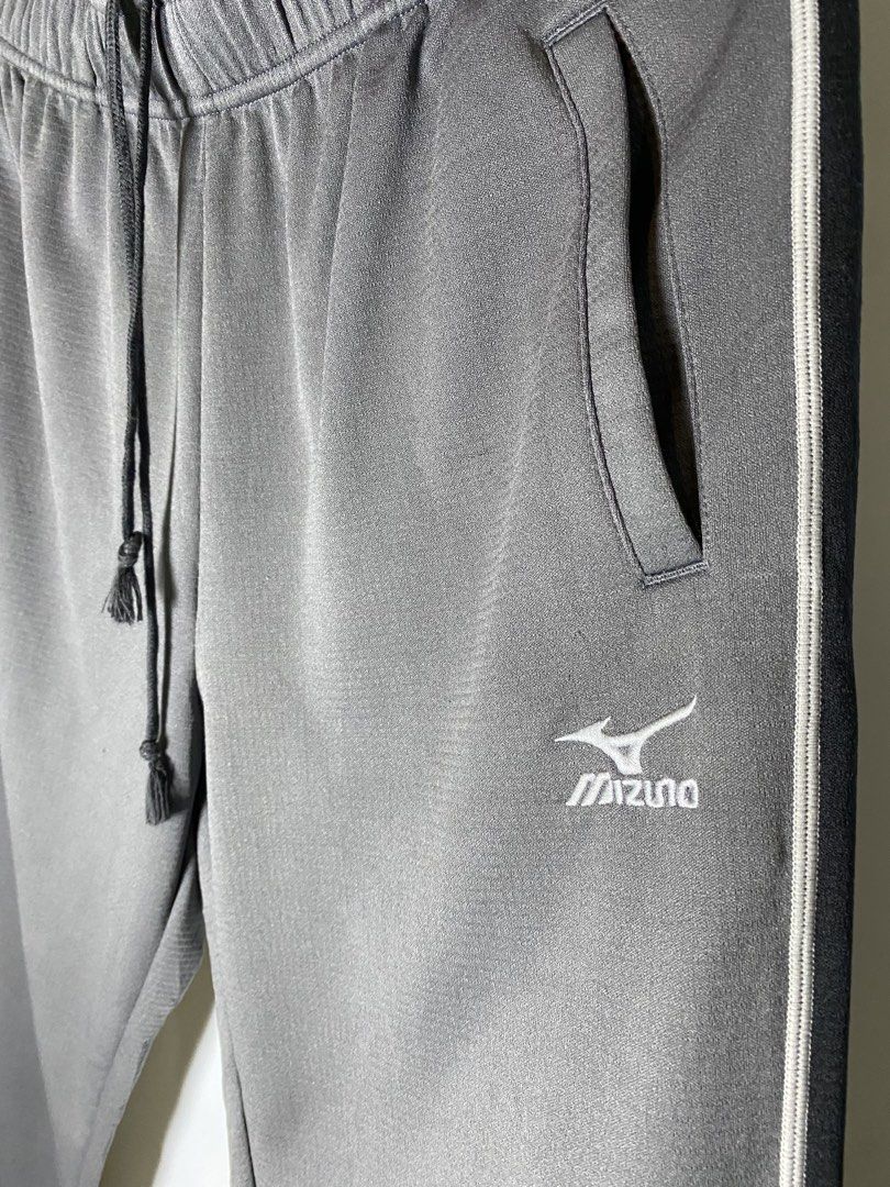 Mizuno gray track pants size xl (Category: Activewear) located in Makati City. Submitted by indaysukaycloset (Listing ID 1467891833, Image 3). Description: Mizuno Gray Track Pants - Size XL (authentic ) Details: - Brand: Mizuno (embroidered logo, not print) - Size on tag: XL good for large to xl - Color: Gray with Black side panel + white piping - Condition: Preloved / in good condition , no flaws - Unisex - pwede pang babae / lalaki Features: - 