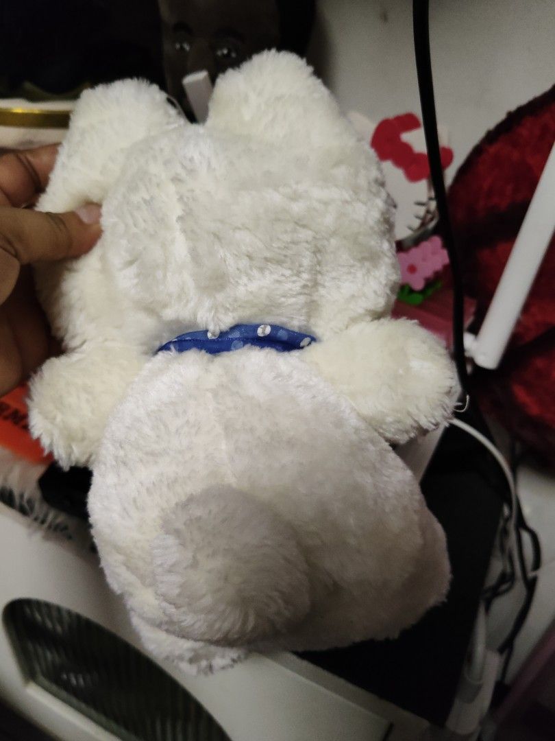 Monchhichi Bunny Plush Doll White with Blue Bow (Category: Plushies & Soft Toys) located in Pasay City. Submitted by ynamariie (Listing ID 1467909405, Image 3). Description: - Adorable 7-inch Monchhichi plush doll - Wears a sweet white bunny hood with a blue polka dot ribbon bow - Features signature brown hair, freckled face, and soft white fur - Flaw note: Minor glue stain on the back of the hood (visible in photos)(missing both hands) - Perfect
