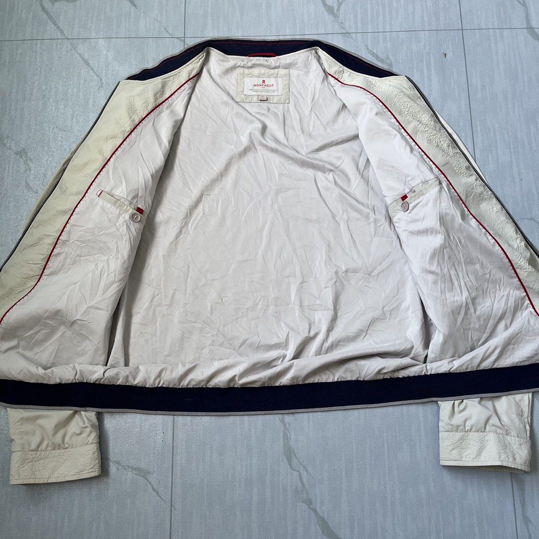 Montagut Paris Bomber Wind Jacket (Authentic) (Category: Coats, Jackets and Outerwear) located in Cavite. Submitted by newclassicwear (Listing ID 1467923206, Image 3). Description: Size 52 On Tag (24width 28length) Excellent Condition None Any Issue 9.8 Honest Color Rate Can Do Meet Up Around Sm Tanza Cavite Tanza📍 Authentic Montagut Paris cream bomber wind jacket in good pre-loved condition. Features a textured body, smooth sleeves, navy ribbed