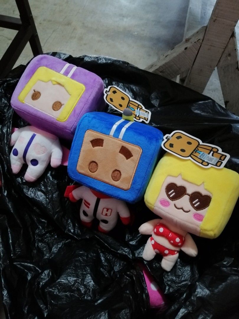 Mr. Box Cube Character Plush Toys Set of 3 (Category: Plushies & Soft Toys) located in Angono. Submitted by rlinee_93 (Listing ID 1467984607, Image 1). Description: - Set of 3 Mr. Box plush toys (Yellow, Blue, Purple) - Distinct square cube heads with unique character expressions and attached tags - Yellow plush wears heart sunglasses and a red polka dot bikini - Blue and purple plushies dressed in detailed space suits with capes - Made with ultr