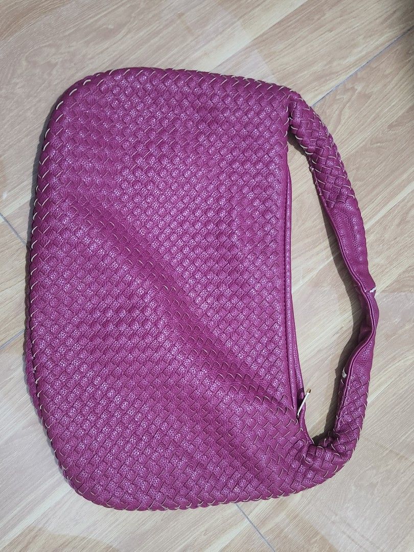 Mumu Select Woven Magenta Shoulder Bag (Category: Shoulder Bags) located in Binan City. Submitted by prettyfishcakeee (Listing ID 1467977895, Image 1). Description: - Brand/Style: Mumu Select shoulder bag in bright magenta - Design: Intricate woven leather pattern on body and strap with gold-tone hardware - Closure: Zip top with branded zip pull - Interior: Clean grey fabric lining with one zip pocket and one slip pocket - Condition: Well-maintai