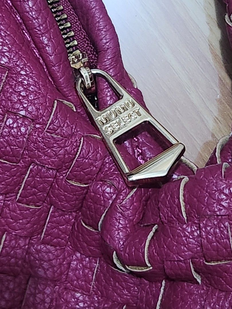 Mumu Select Woven Magenta Shoulder Bag (Category: Shoulder Bags) located in Binan City. Submitted by prettyfishcakeee (Listing ID 1467977895, Image 2). Description: - Brand/Style: Mumu Select shoulder bag in bright magenta - Design: Intricate woven leather pattern on body and strap with gold-tone hardware - Closure: Zip top with branded zip pull - Interior: Clean grey fabric lining with one zip pocket and one slip pocket - Condition: Well-maintai