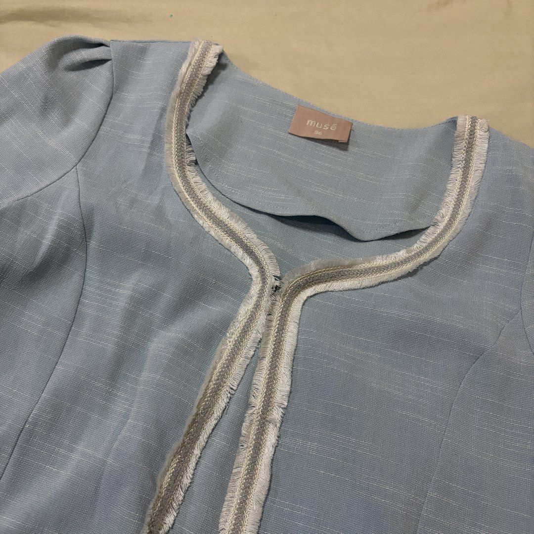 Musé Light Blue Cropped Tweed Jacket Size 36 (Category: Coats, Jackets and Outerwear) located in Mandaluyong City. Submitted by afterceej (Listing ID 1467979363, Image 3). Description: - Brand: Musé - Color: Light blue with white and silver fringe trim - Size: 36 - Style: Open front, cropped length, structured fit - Details: Puffed shoulders, 3/4 sleeves, two small faux pockets - Perfect for: Workwear, smart-casual days, or upgrading an everyday 