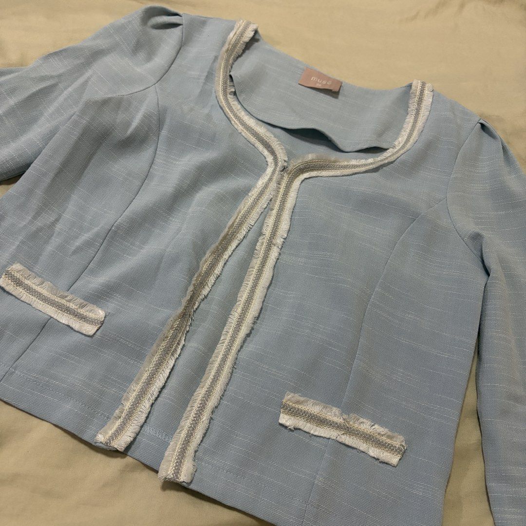 Musé Light Blue Cropped Tweed Jacket Size 36 (Category: Coats, Jackets and Outerwear) located in Mandaluyong City. Submitted by afterceej (Listing ID 1467979363, Image 2). Description: - Brand: Musé - Color: Light blue with white and silver fringe trim - Size: 36 - Style: Open front, cropped length, structured fit - Details: Puffed shoulders, 3/4 sleeves, two small faux pockets - Perfect for: Workwear, smart-casual days, or upgrading an everyday 