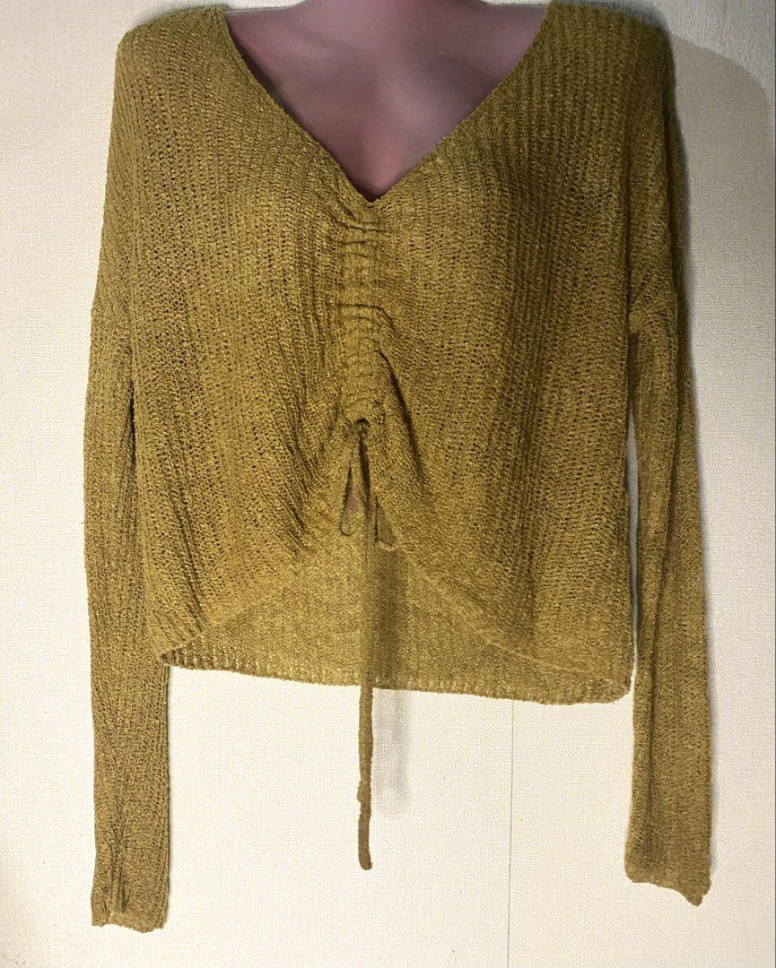 Mustard Yellow V-Neck Knit Sweater with Drawstring Front (Category: Coats, Jackets and Outerwear) located in Las Pinas. Submitted by jewicka (Listing ID 1467987517, Image 1). Description: - S on tag but runs a bit bigger M-L - Color: Mustard yellow - Style: Cropped V-neck knit sweater - Features: Long sleeves, adjustable front drawstring cinch - Material: Lightweight, textured, and stretchy fabric - Fit: True to size, great for layering in cooler