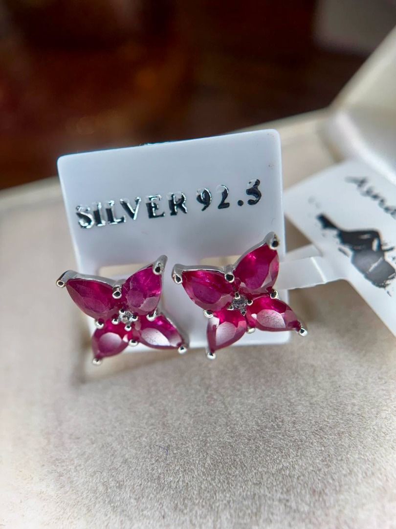 Natural Ruby in Silver Floral Stud Earrings (Category: Earrings) located in Baguio. Submitted by asna_taku (Listing ID 1467909742, Image 2). Description: ❤️ Natural Ruby in Silver Floral Stud Earrings Simple, feminine, and eye-catching. ✨ ❤️ Natural Ruby 🤍 Bnew silver setting 🌸 Elegant 4-petal floral design ✨ Beautiful faceted rubies with a rich pinkish-red glow 5 pairs available 💰 ₱4,480/pair A pretty everyday statement piece for the ladies w
