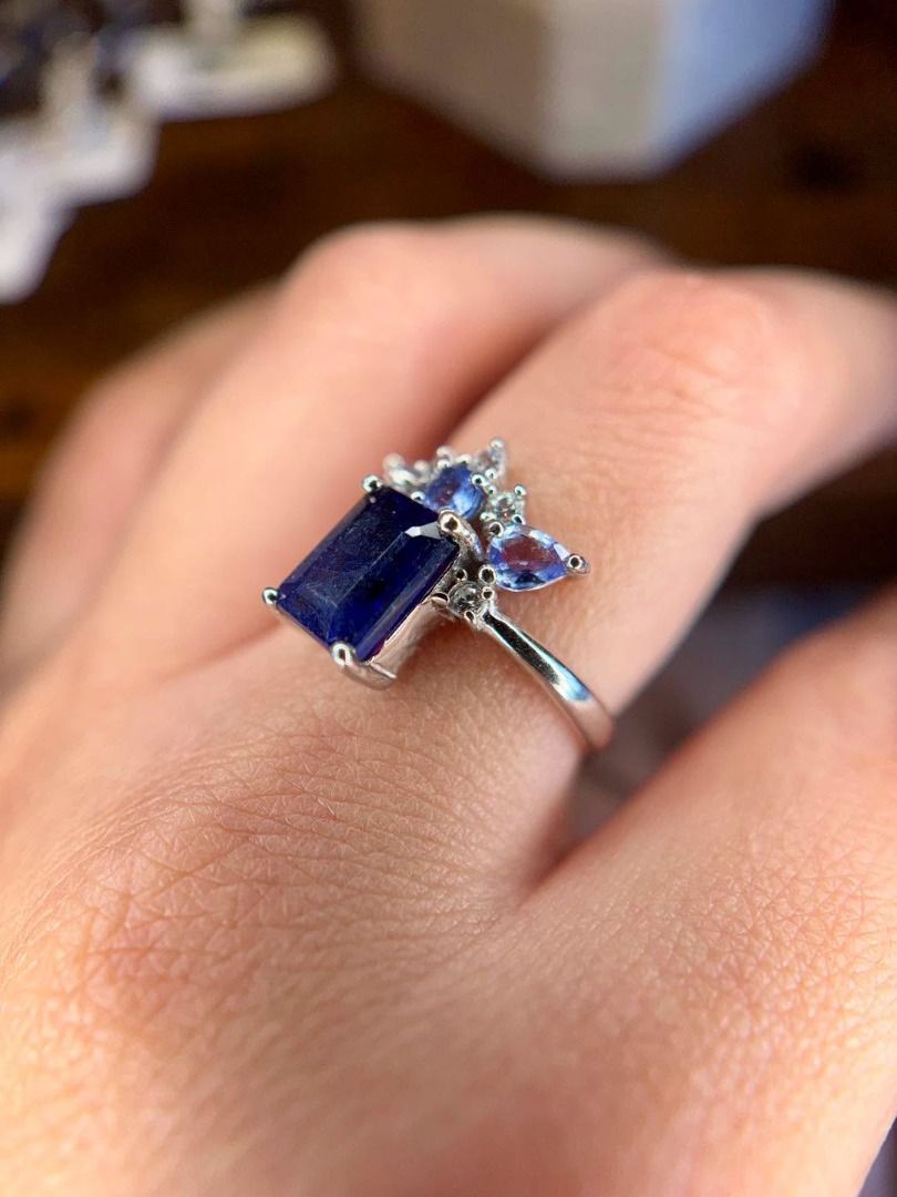 NATURAL SAPPHIRE & TANZANITE IN CROWN-INSPIRED SILVER SETTING (Category: Rings) located in Baguio. Submitted by asna_taku (Listing ID 1467904937, Image 2). Description: 👑 NATURAL SAPPHIRE & TANZANITE IN CROWN-INSPIRED SILVER SETTING 💙💜 A regal combination of deep blue Natural Sapphire accented with sparkling Tanzanite, arranged in a beautiful crown-like silhouette. The pointed gemstone accents rising around the center give this ring an elegant