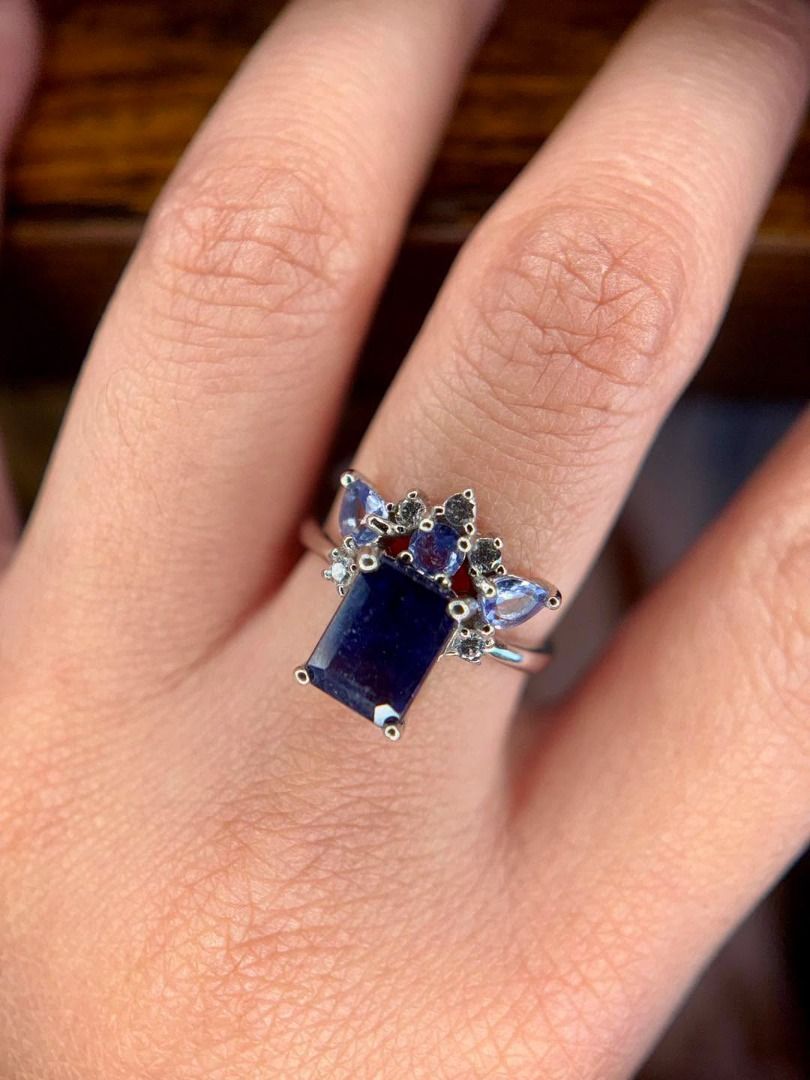 NATURAL SAPPHIRE & TANZANITE IN CROWN-INSPIRED SILVER SETTING (Category: Rings) located in Baguio. Submitted by asna_taku (Listing ID 1467904937, Image 1). Description: 👑 NATURAL SAPPHIRE & TANZANITE IN CROWN-INSPIRED SILVER SETTING 💙💜 A regal combination of deep blue Natural Sapphire accented with sparkling Tanzanite, arranged in a beautiful crown-like silhouette. The pointed gemstone accents rising around the center give this ring an elegant