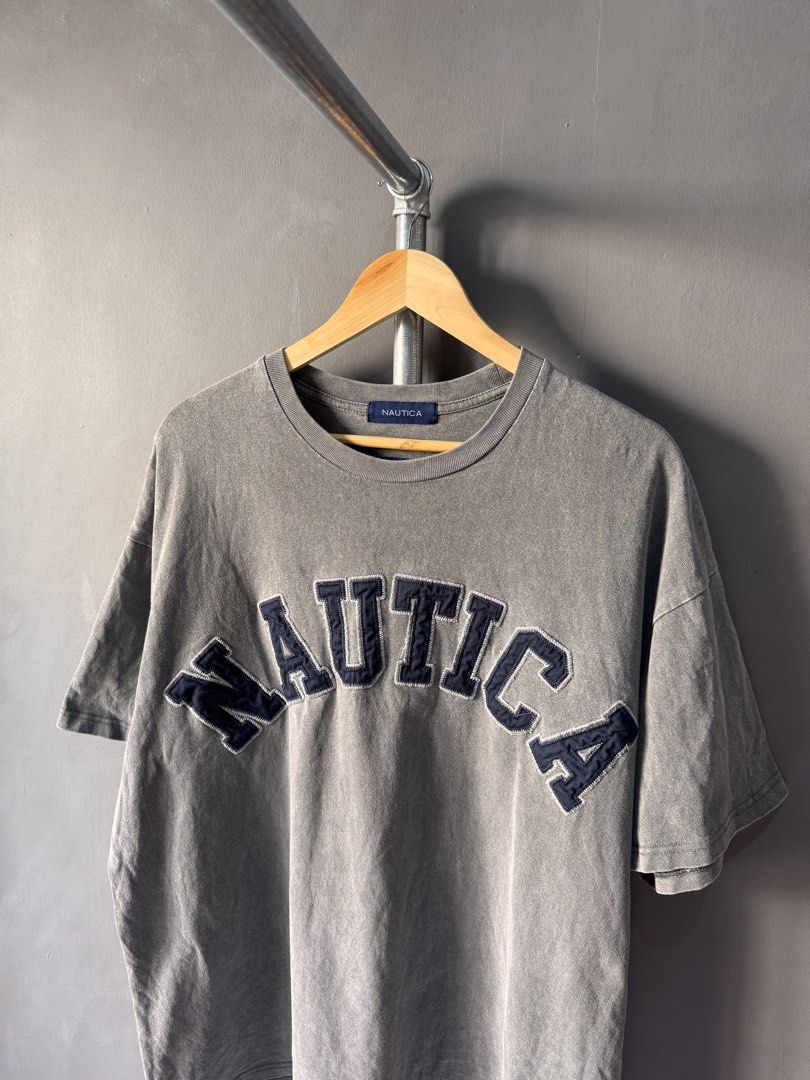 Nautica - Grey Washed Graphic T-Shirt (Category: Activewear) located in Cabuyao City. Submitted by _streetflavor (Listing ID 1467972737, Image 2). Description: Nautica - Grey Washed Graphic T-Shirt Excellent Size: Fits L-XL boxi Length: 28 Width: 25 -1,280 pesos Dm.