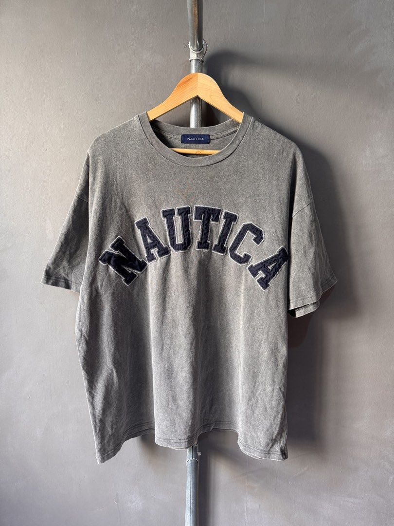 Nautica - Grey Washed Graphic T-Shirt (Category: Activewear) located in Cabuyao City. Submitted by _streetflavor (Listing ID 1467972737, Image 1). Description: Nautica - Grey Washed Graphic T-Shirt Excellent Size: Fits L-XL boxi Length: 28 Width: 25 -1,280 pesos Dm.
