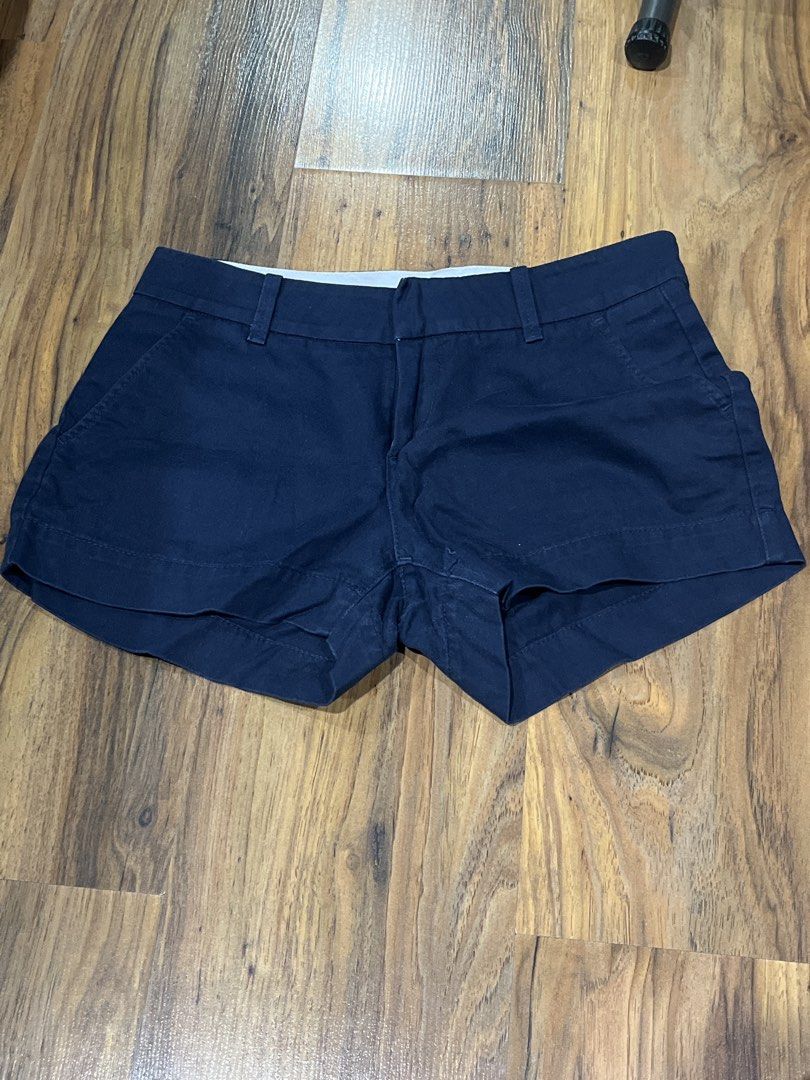 Navy Blue Cuffed Chino Shorts (Category: Shorts) located in Quezon City. Submitted by zinniemon (Listing ID 1467903169, Image 1). Description: - Color: Dark navy blue - Style: Low-rise with belt loops and rolled cuffs - Pockets: Front pockets included - Fabric: Lightweight and breathable for warm weather - Fit: Classic, clean finish, and versatile wardrobe staple.
