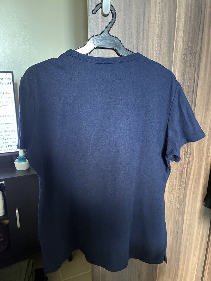 Navy Blue Short Sleeve T-Shirt (Category: Tshirts & Polo Shirts ) located in Las Pinas. Submitted by mrcolorless (Listing ID 1467912190, Image 2). Description: - Color: Solid dark blue - Design: Classic crew neckline, short sleeves - Fit: Standard fit - Style: Clean minimalist look with no prints or logos - Versatility: Perfect basic piece for everyday casual wear.