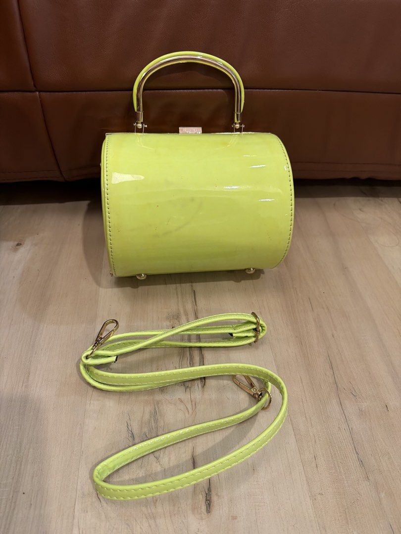 Neon barrel bag (Category: Luxury Bags & Wallets) located in Manila. Submitted by _____car0usell (Listing ID 1467985186, Image 1). Description: bought in US with straps used once only see pics re stain.