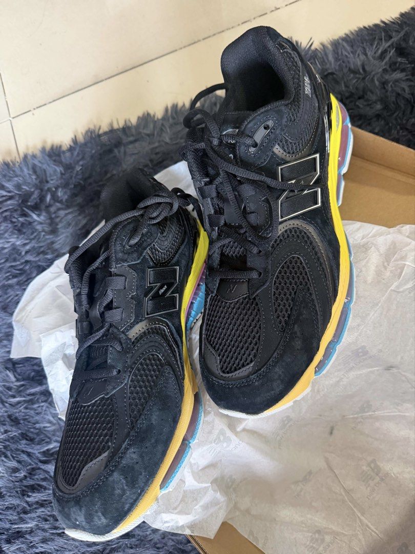 New Balance 1954r Black Multi-Color (Category: Casual Shoes) located in Quezon City. Submitted by jyraam (Listing ID 1468057878, Image 2). Description: - Model: New Balance 1954r - Colorway: Black with vibrant yellow, blue, and pink details - Size: US 10.5 - Materials: Premium mesh and suede upper - Sole: Chunky midsole with colorful cushioning units - Condition: Fresh condition all around, clean outsoles - Inclusions: Original box included.