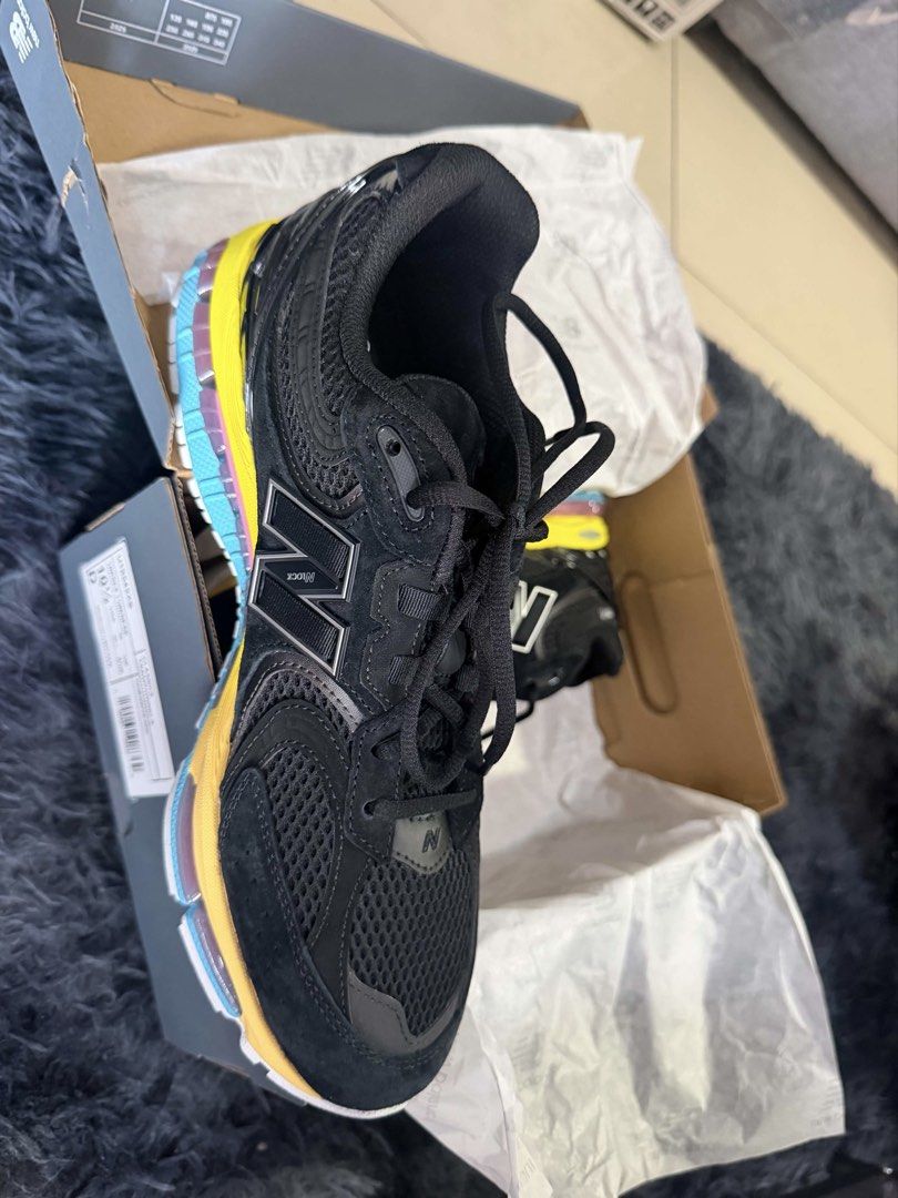 New Balance 1954r Black Multi-Color (Category: Casual Shoes) located in Quezon City. Submitted by jyraam (Listing ID 1468057878, Image 3). Description: - Model: New Balance 1954r - Colorway: Black with vibrant yellow, blue, and pink details - Size: US 10.5 - Materials: Premium mesh and suede upper - Sole: Chunky midsole with colorful cushioning units - Condition: Fresh condition all around, clean outsoles - Inclusions: Original box included.