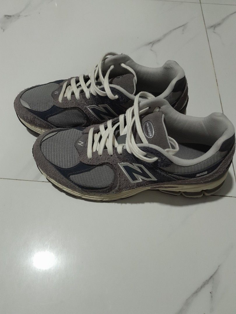 New Balance 2002R Protection Pack Rain Cloud (Category: Sneakers) located in Las Pinas. Submitted by maljun1972 (Listing ID 1467957680, Image 1). Description: - Model: New Balance 2002R Grey - Design: Distressed suede panels with raw edges, grey mesh base, and white laces - Comfort: Cream midsole equipped with N-ergy cushioning - Condition: Worn a few times, minor dirt on soles from normal walking, tread in great shape -With box - Authentic and r