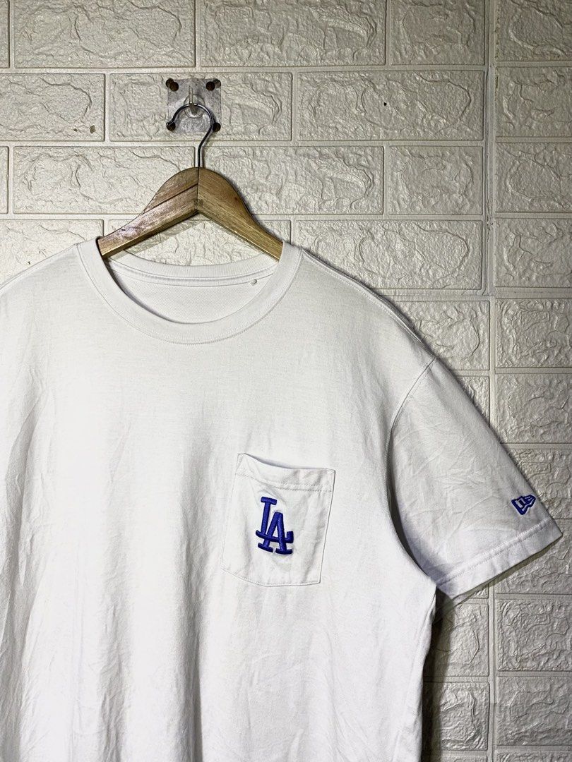 New Era x MLB LA T-Shirt (Category: Tshirts & Polo Shirts ) located in Davao. Submitted by vanthriftfinds5 (Listing ID 1467857075, Image 3). Description: 📌No Issue 📌Excellent condition 📌Size” XL on tag •Length: 28.5 •Width: 22 📌Color Rate 9.9/10 DM TO PURCHASE.📩 🏙️ Location: Davao City 8000 📌Shipping Nationwide. Payment First Basis. No COD. Can provide ids and vouch for your safety. Mode of payment: Gcash Delivery Courier: JNT EXPRESS,LBC 