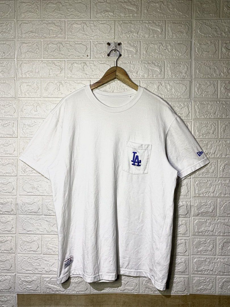 New Era x MLB LA T-Shirt (Category: Tshirts & Polo Shirts ) located in Davao. Submitted by vanthriftfinds5 (Listing ID 1467857075, Image 1). Description: 📌No Issue 📌Excellent condition 📌Size” XL on tag •Length: 28.5 •Width: 22 📌Color Rate 9.9/10 DM TO PURCHASE.📩 🏙️ Location: Davao City 8000 📌Shipping Nationwide. Payment First Basis. No COD. Can provide ids and vouch for your safety. Mode of payment: Gcash Delivery Courier: JNT EXPRESS,LBC 