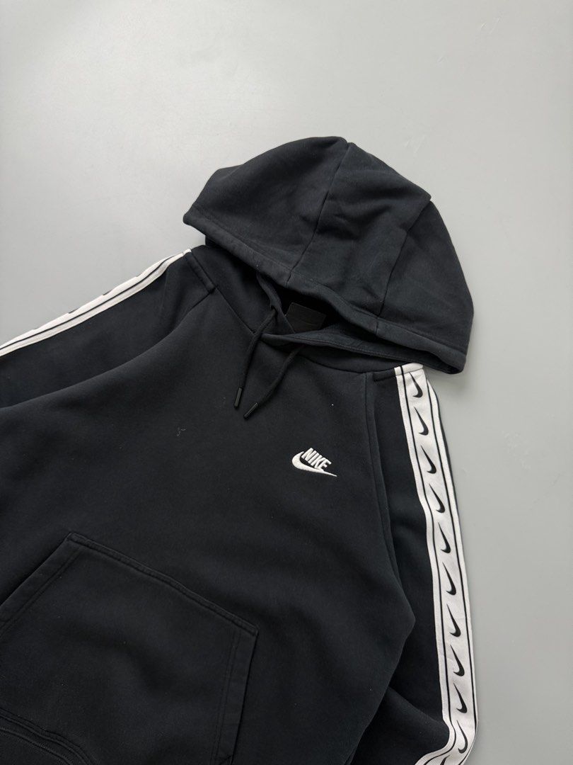 Nike (Category: Coats, Jackets and Outerwear) located in Pila. Submitted by villanueva80826 (Listing ID 1467980114, Image 3). Description: Nike side tape pullover hoodie Size:small •Width:20.5 •Length:24 •Condition:9/10 •Color rate:9/10 Mine:590 +Shipping fee Issue:sign of usage like pinhole uneven fading part Still in good condition Still wearable .