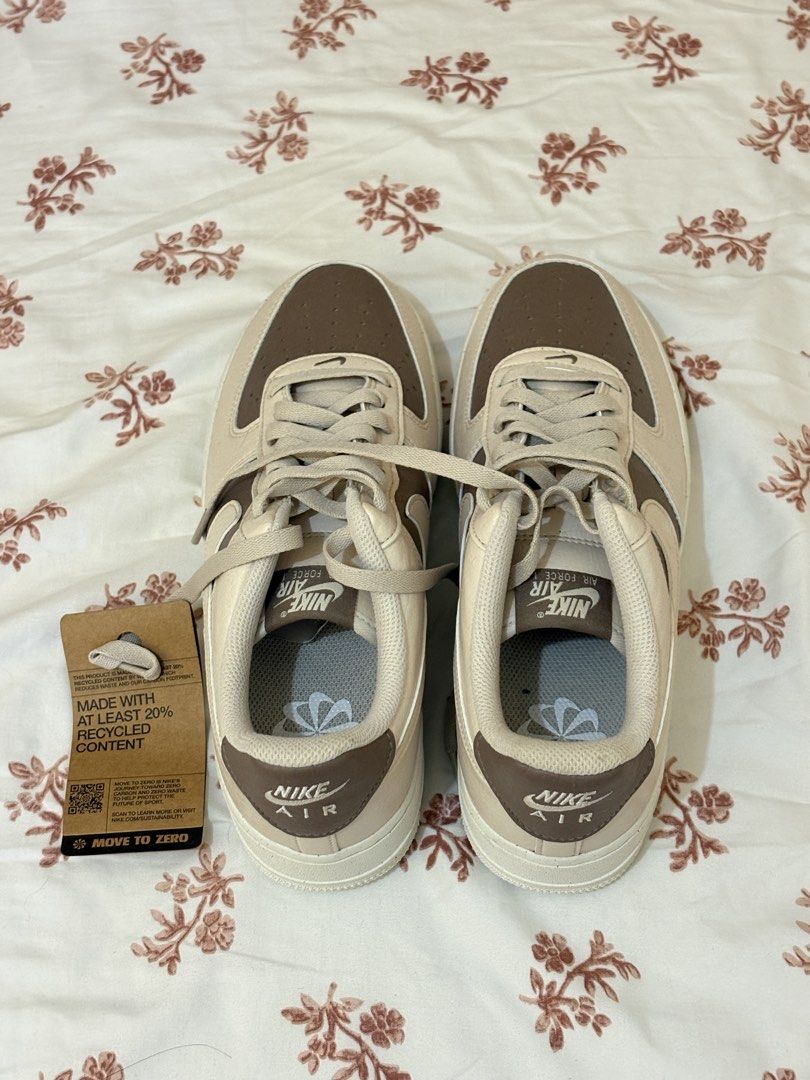 Nike Air Force 1 Brown Beige Sneakers (Category: Sneakers) located in Marikina City. Submitted by jsv (Listing ID 1467932227, Image 2). Description: - Brand: Nike Air Force 1 - Colorway: Brown and beige - Condition: Brand new, never worn, with original tags still attached - Sustainability: Move to Zero collection, made with at least 20% recycled content - No Box - rfs: Wrong size.