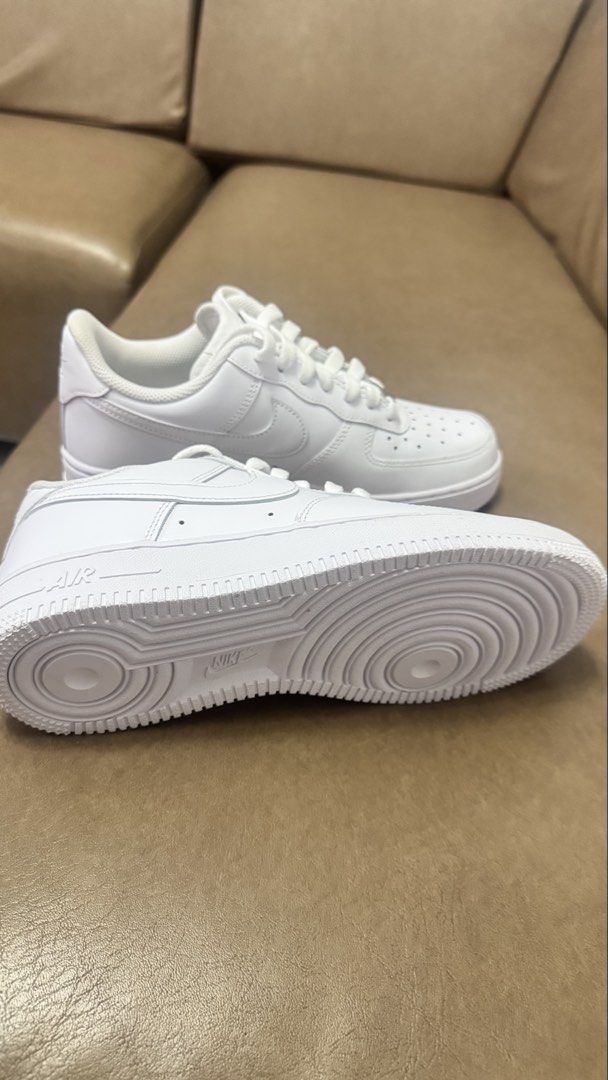 Nike Air Force 1 Low Triple White (Category: Sneakers) located in Agdangan. Submitted by chiechie.567 (Listing ID 1467995449, Image 3). Description: - Brand/Model: Nike Air Force 1 Low (All-White) - Condition: Like new, zero toe box crease marks, clean soles - Material: Crisp white leather upper with chunky rubber sole - Features: Matching laces and iconic silver AF1 lace dubrae - Style: Versatile streetwear staple that goes with any outfit.
