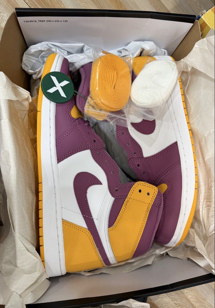 Nike Air Jordan 1 Retro High OG (Category: Sneakers) located in Tabuk. Submitted by farawayluxe (Listing ID 1468046185, Image 2). Description: Air Jordan 1 Retro High OG University GoldLight Bordeaux 100% Authentic (StockX Verified!) NEW IN BOX (missing top lid) Men’s Size US 10.